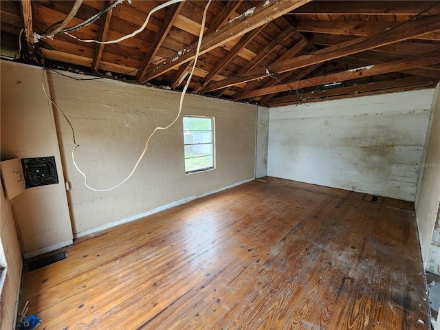 basement featuring hardwood / wood-style flooring