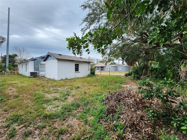 view of yard featuring central AC