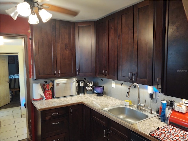 kitchen with sink, ceiling fan, and light tile patterned flooring