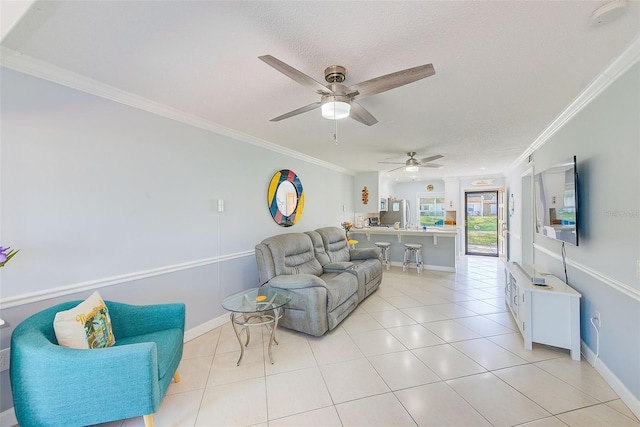 tiled living room with crown molding and a textured ceiling