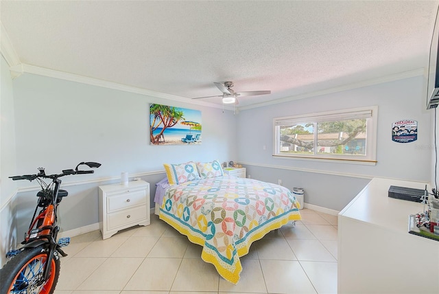 bedroom featuring ceiling fan, ornamental molding, a textured ceiling, and light tile patterned floors