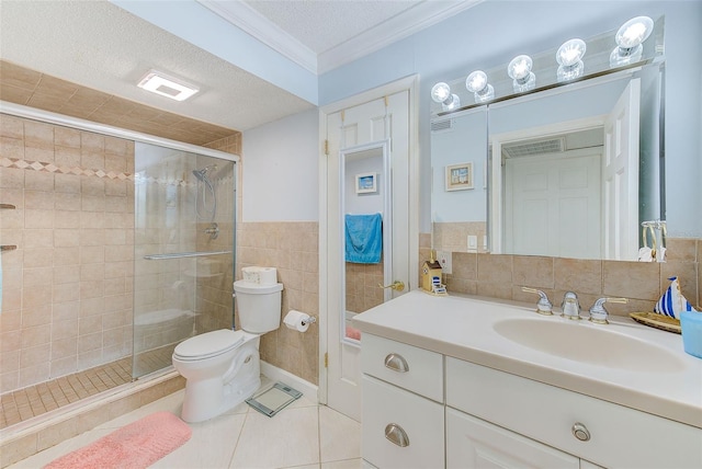 bathroom featuring crown molding, tile walls, a textured ceiling, tile patterned floors, and toilet