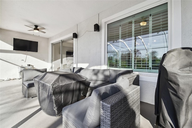 view of patio / terrace featuring outdoor lounge area, a grill, and ceiling fan