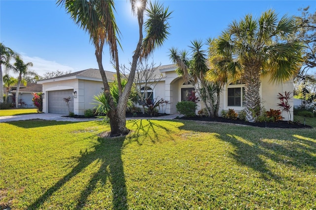 single story home with a garage and a front yard