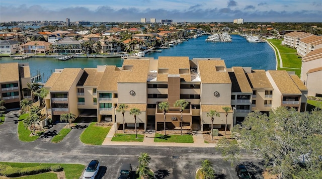 birds eye view of property featuring a water view