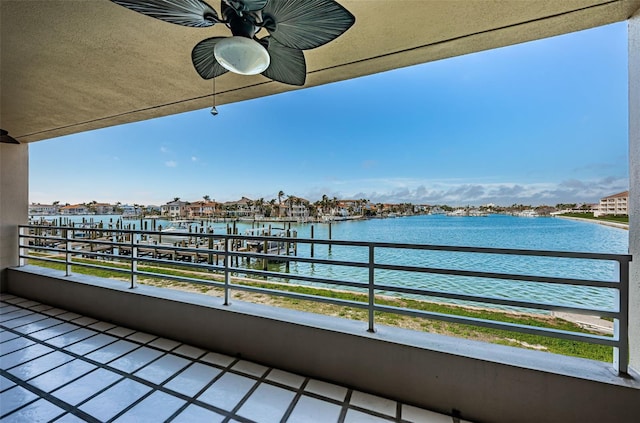 balcony featuring a water view