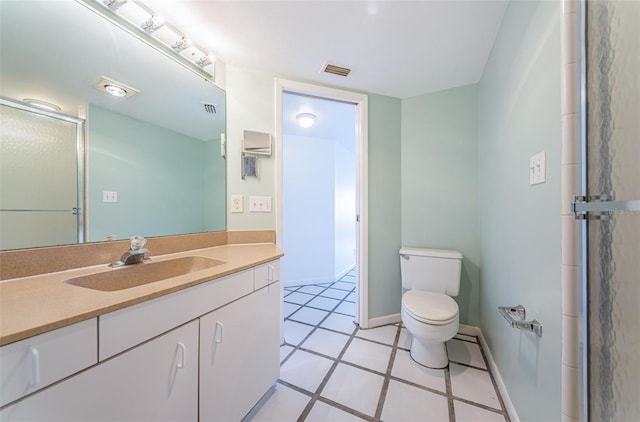 full bath featuring visible vents, toilet, vanity, baseboards, and tile patterned floors