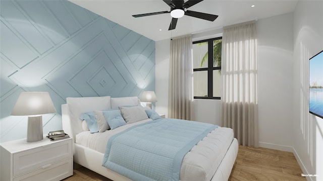 bedroom featuring ceiling fan and light hardwood / wood-style floors