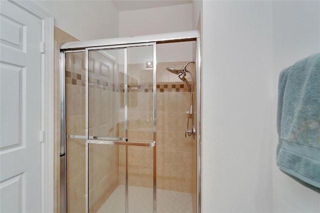 bathroom featuring walk in shower