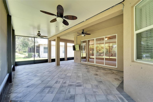 unfurnished sunroom with a healthy amount of sunlight