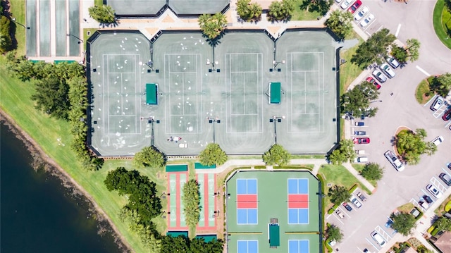 birds eye view of property with a water view