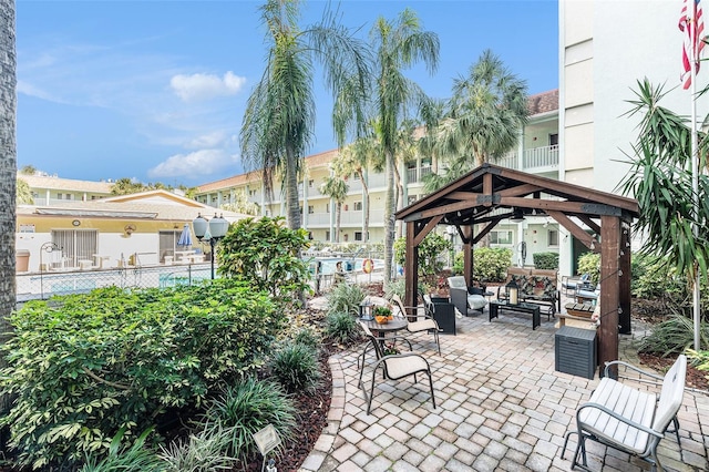 view of patio / terrace featuring a gazebo and an outdoor hangout area