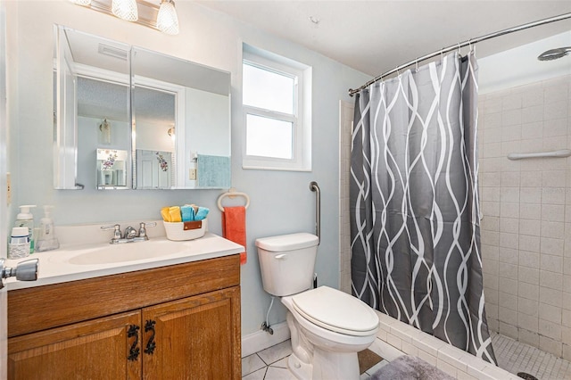 bathroom featuring vanity, toilet, curtained shower, and tile patterned flooring