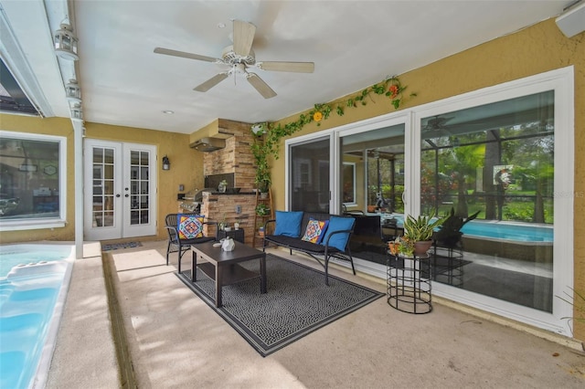 view of patio featuring outdoor lounge area, a ceiling fan, and french doors