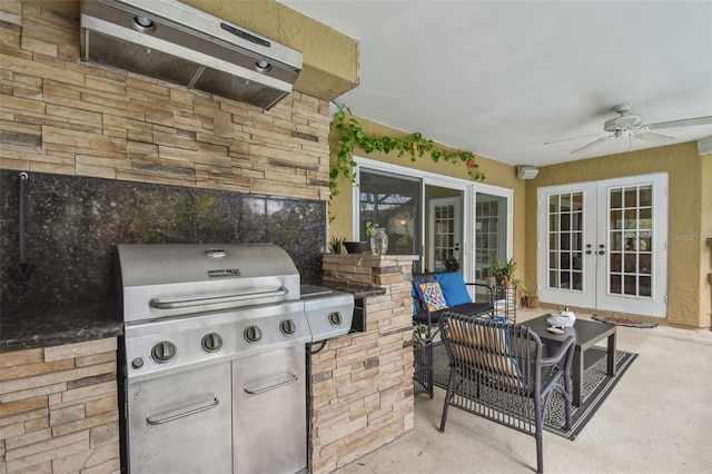 view of patio / terrace with outdoor lounge area, a ceiling fan, and french doors