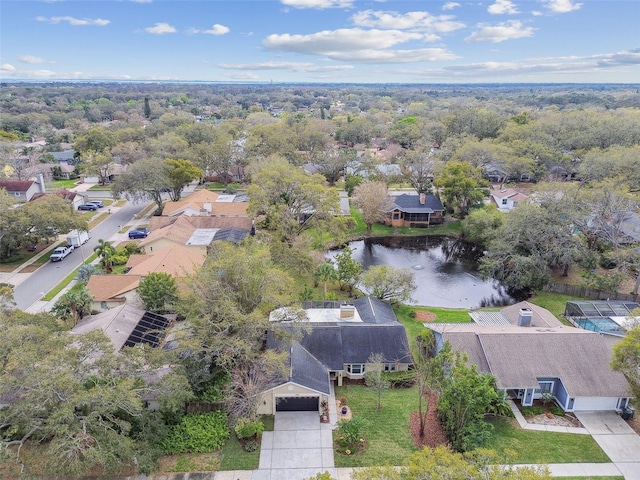 bird's eye view with a water view and a residential view