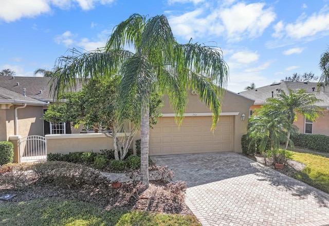 view of front of property with a garage