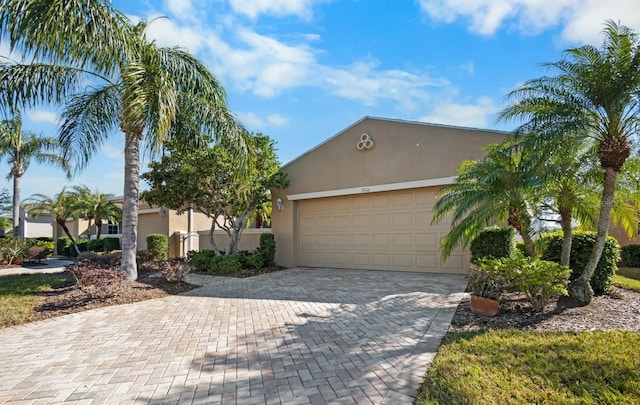 view of front of property with a garage