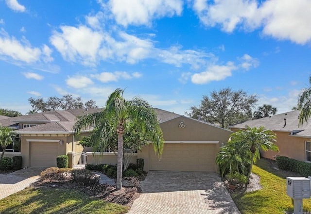 single story home featuring a garage