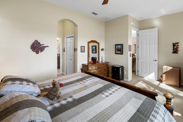 carpeted bedroom featuring ceiling fan