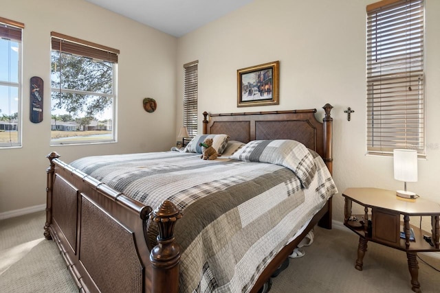 bedroom with light carpet