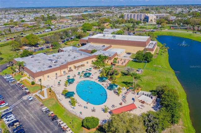 birds eye view of property featuring a water view