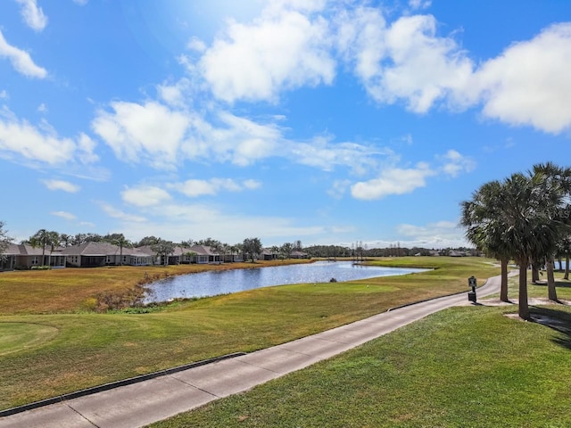 view of community with a water view