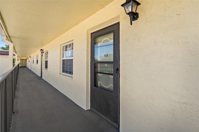 property entrance with a balcony