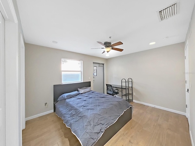 bedroom featuring ceiling fan and light wood-type flooring