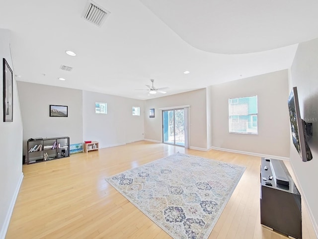 interior space featuring ceiling fan and light wood-type flooring