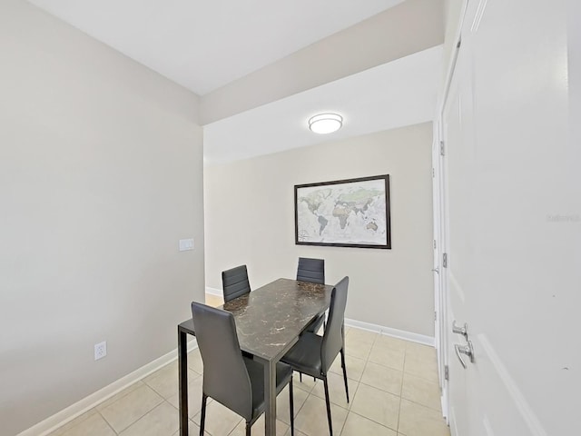 dining room featuring light tile patterned floors