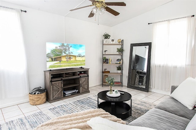 tiled living room featuring plenty of natural light and ceiling fan