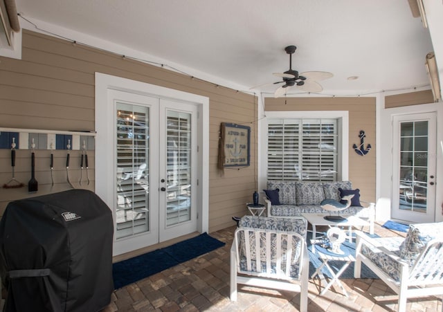 view of patio / terrace with a grill, an outdoor hangout area, french doors, and ceiling fan