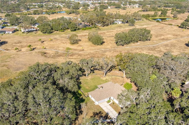 drone / aerial view with a rural view and a water view