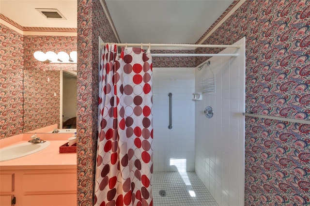 bathroom featuring vanity and a shower with curtain