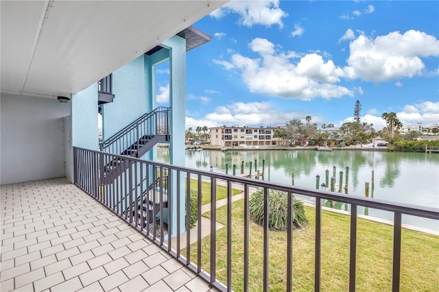 balcony featuring a water view