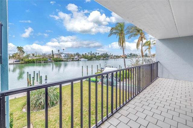 balcony featuring a water view