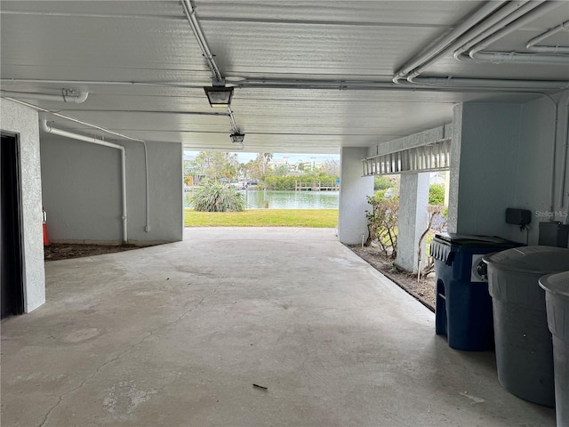 garage featuring a water view