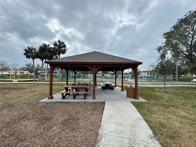 view of home's community with a gazebo and a lawn