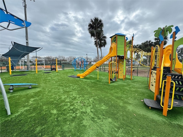 view of playground featuring a lawn