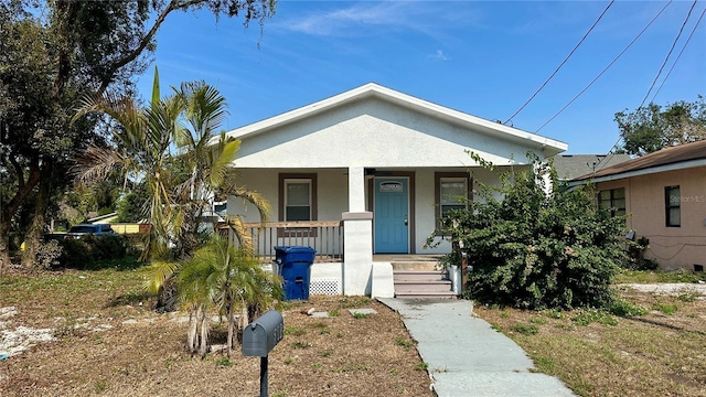 bungalow-style home featuring a porch