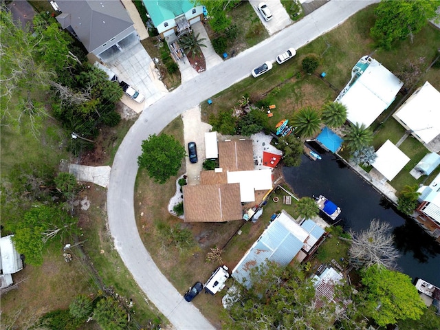 birds eye view of property featuring a residential view and a water view