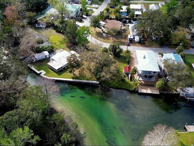 aerial view featuring a water view and a residential view