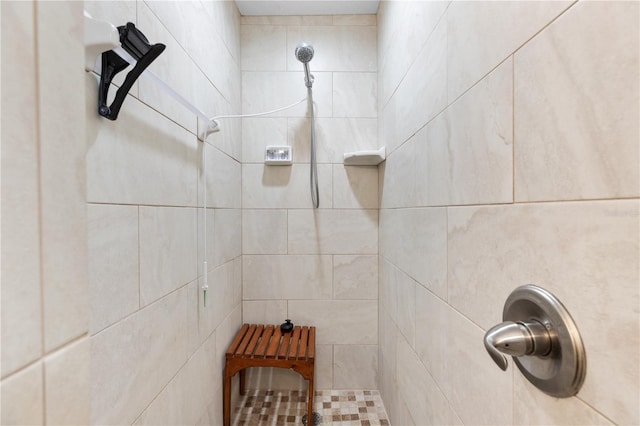 interior space with a tile shower