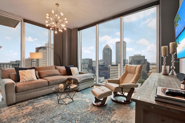 living area featuring floor to ceiling windows and a chandelier