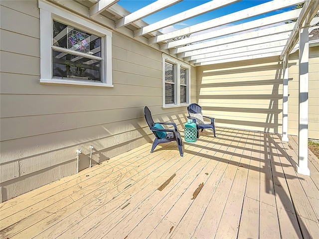 wooden terrace featuring a pergola