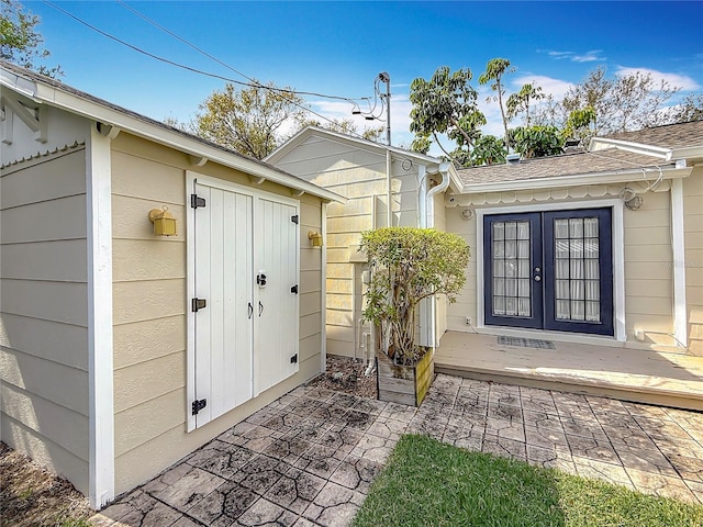 property entrance with french doors and a patio area