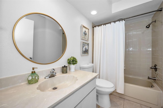 full bathroom featuring shower / tub combo, vanity, toilet, and tile patterned flooring