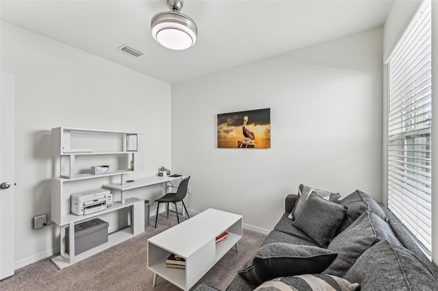 office area with dark colored carpet