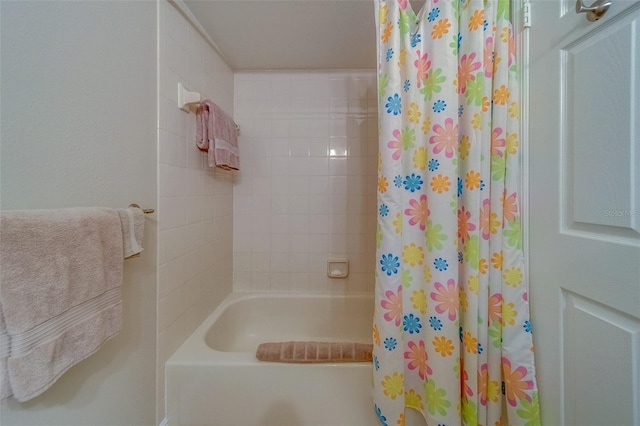 bathroom featuring shower / tub combo